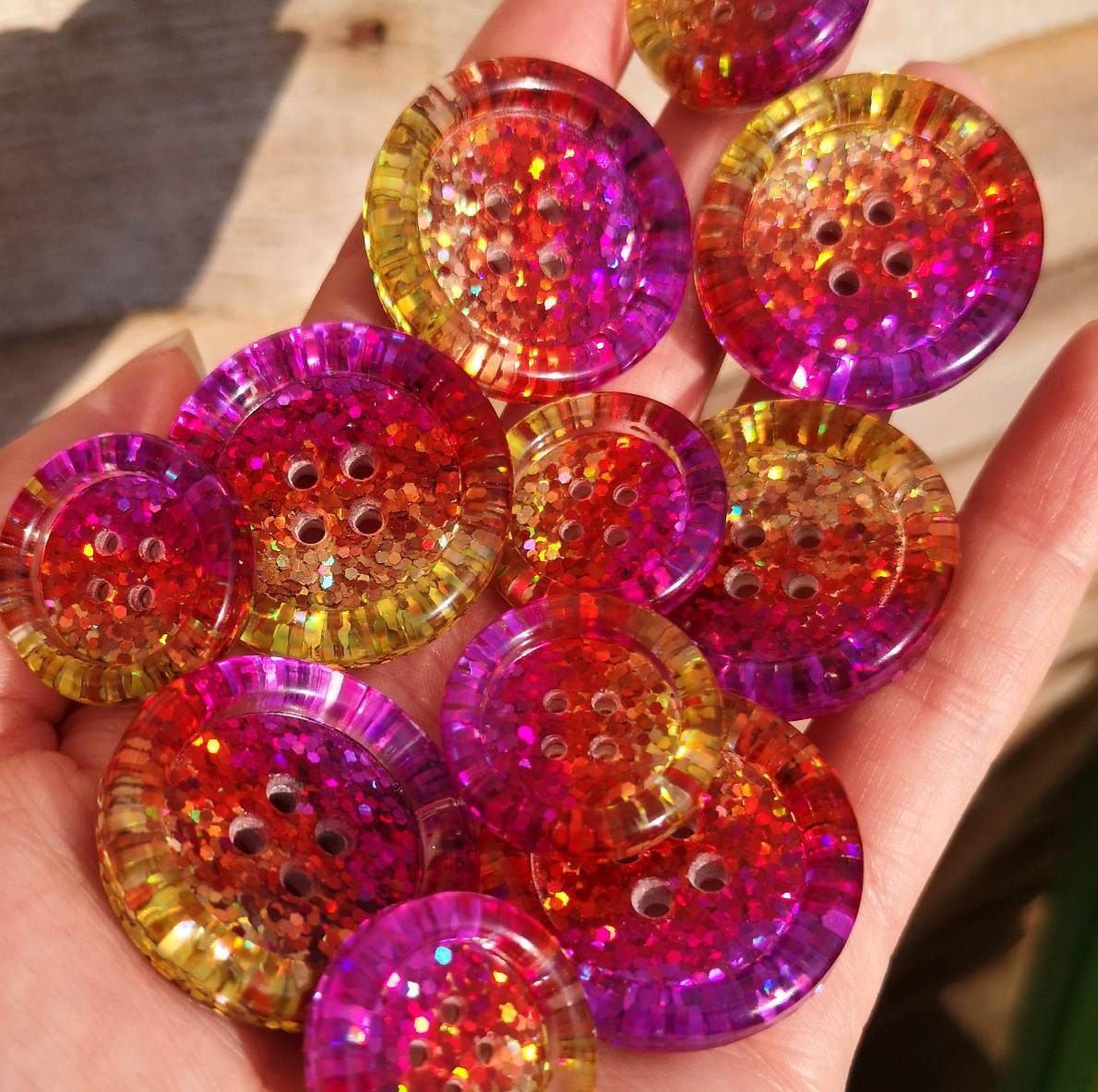 Malibu Sunset dazzler buttons - purple - pink - orange - gold - yellow - glitter. Club Tropicana-tastic!