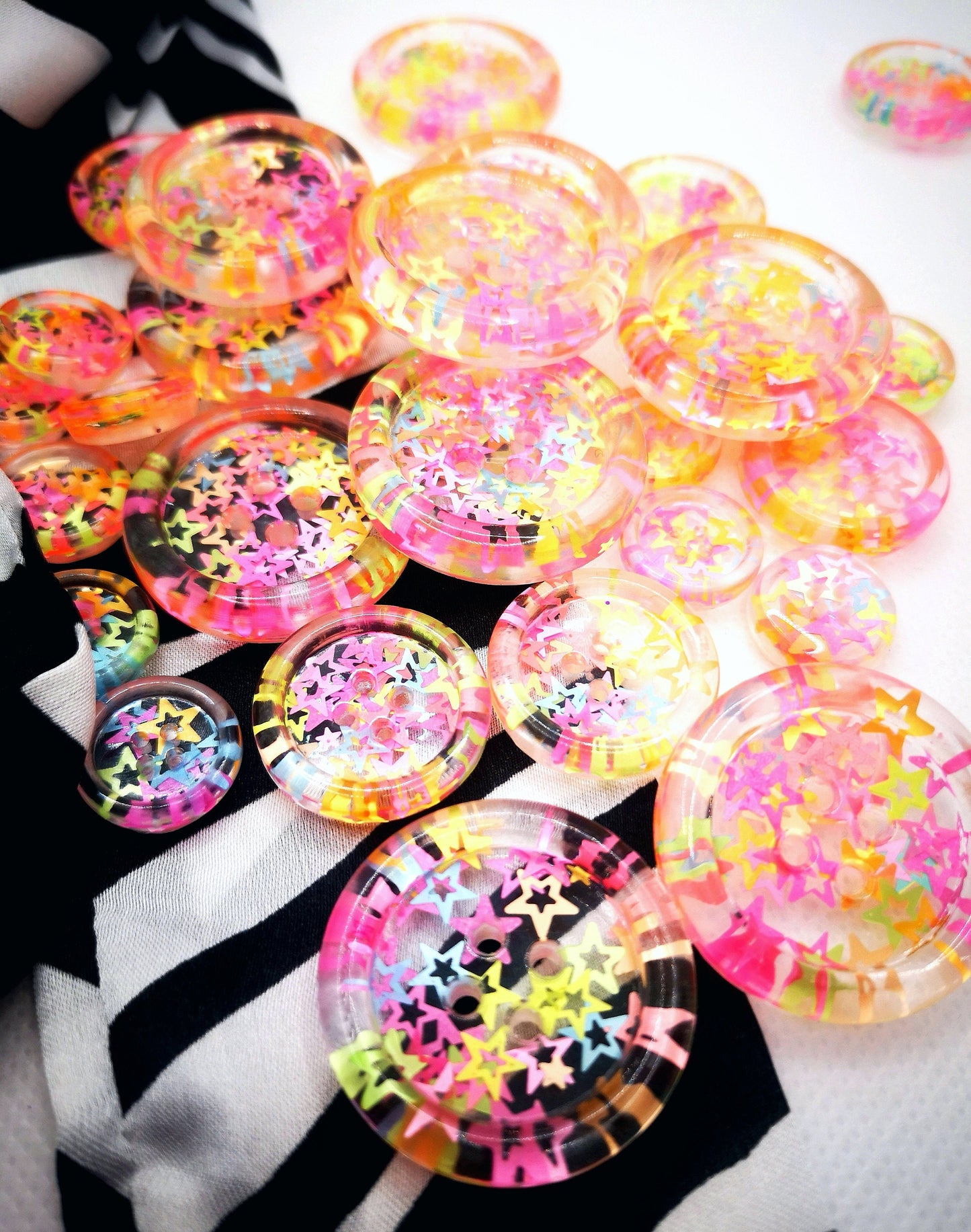 The Stars in Their Eyes button – Glossy Transparent Button with pearly Neon Star Magic