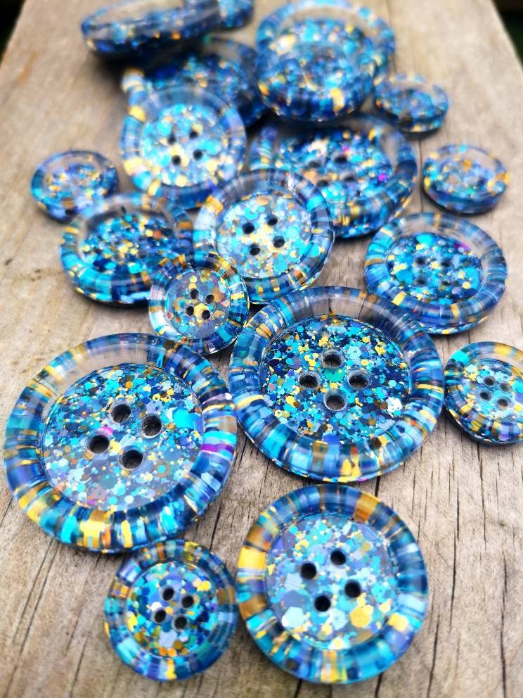 The Midsommer Button – Enchanted Resin Button with Blue, Gold and Purple Sparkle