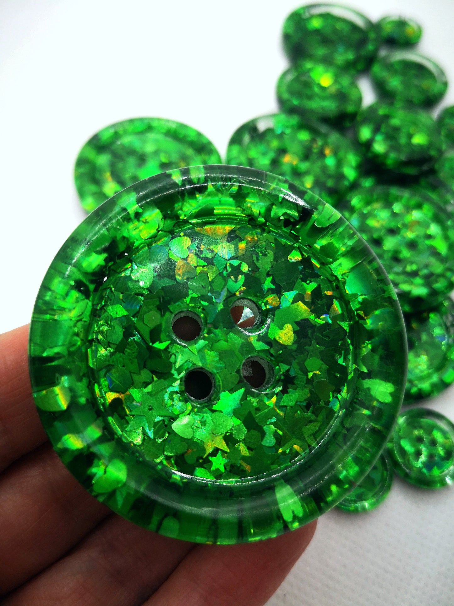 The Green-eyed Monster button - Colour shifting emerald green holographic iridescent glitter