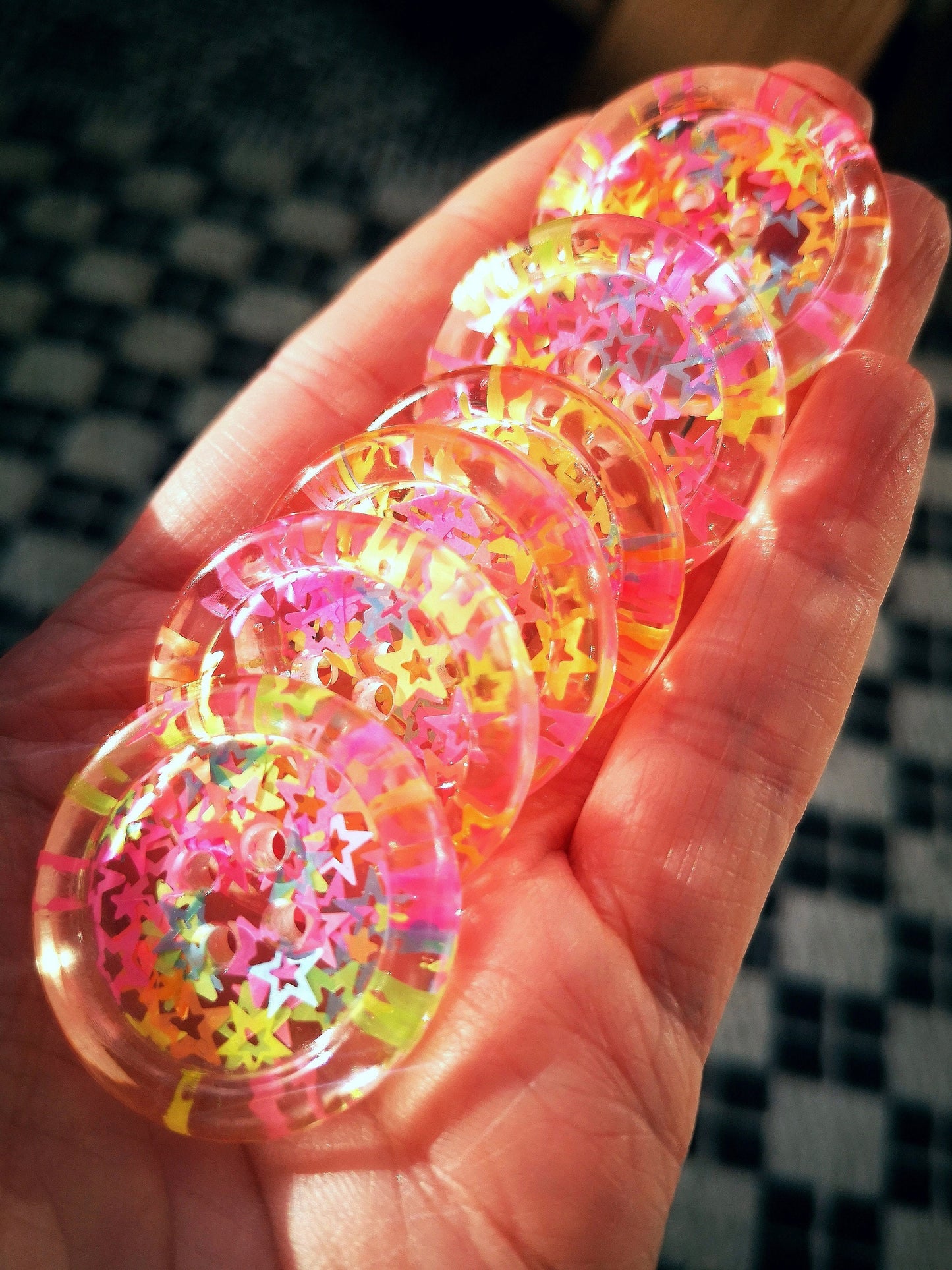 The Stars in Their Eyes button – Glossy Transparent Button with pearly Neon Star Magic